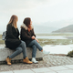 Two female friends sitting on a bench - PhotoDune Item for Sale