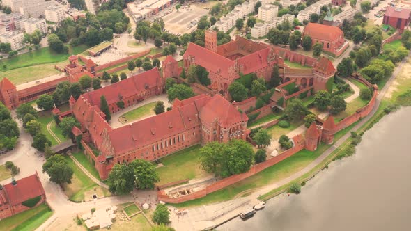 Castle fortifications of the Teutonic Order in Malbork from East. Malbork Castle is the largest cast alt