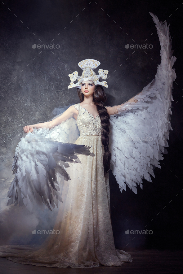 Art angel girl with wings fairy image. Swan Princess, Queen of angels. Lovely dress with wings
