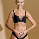 Studio Shot of Happy Mature Woman with Fit Body in Black Underwear Touching  Her Chin and Smiling Aside while Standing Stock Image - Image of face,  blonde: 219857989
