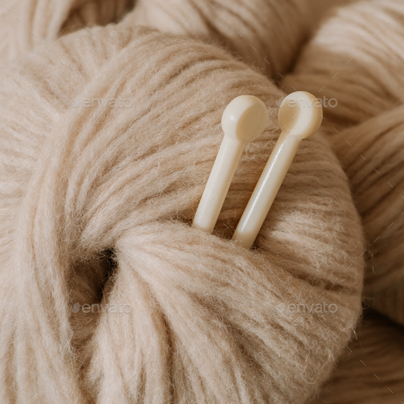 Aesthetic beige yarn skein, close up Stock Photo by Fasci