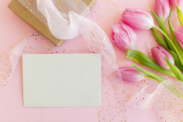 Happy womens day. Empty greeting card, pink tulips, gift box flat