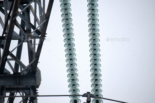 Electric power lines divided by safe guard insulating frame transfening safely high voltage