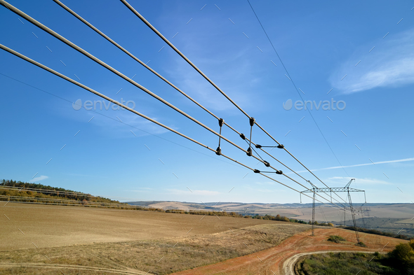Electric power lines divided by safe guard insulating frame transfening safely high voltage