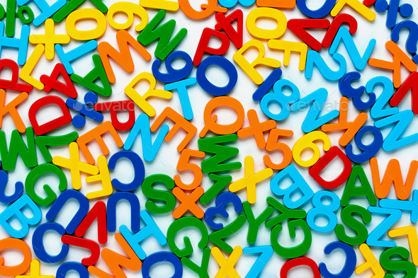 Alphabet, multicolor background with plastic numbers and letters. ABC. Education concept.