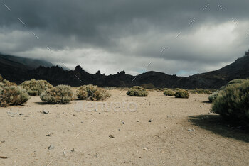 Dark desert mountains.