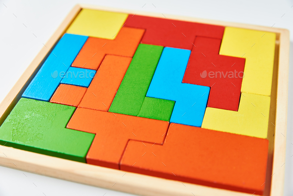 Different wooden blocks on white background. Concept of logical thinking and education