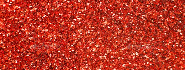 glittering background of a red sequins closeup. Sparkle festive texture ...