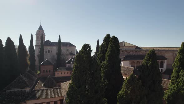 Low aerial pan reveals Islamic architecture of Alhambra palace complex