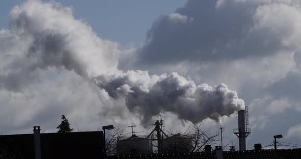 Smokestack of Sugar Refinery with Water Vapour, Near Caen in Normandy, Real Time 4K alt