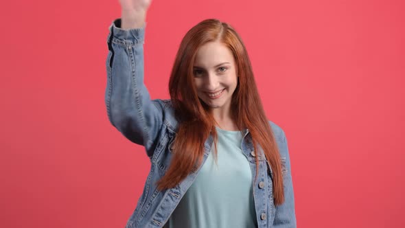 Friendly Beautiful Woman Saying Hi and Smiling, Welcoming Friends with Hand alt