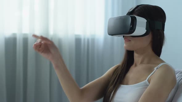 Female Worker in Headset Scrolling Virtual Screen, Freelance Project, Network alt