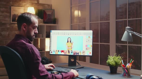 Creative Photographer Working on Photos at Night alt