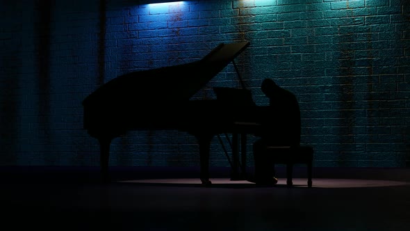 Man Playing Piano in Dark Room