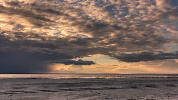 Clouds over Beach Landscape at Sunset.