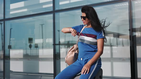 Pleasant Travel Lady Waiting Aircraft Departure Flight at International Airport Terminal Outdoor alt