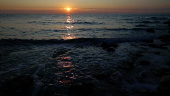 Sunrise on the coast of the sea