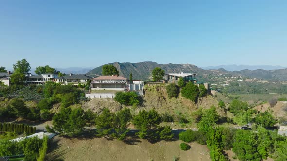 Aerial Luxury Real Estate, Drone Shot of Hollywood Hills Homes on Beautiful Sunny California Day alt