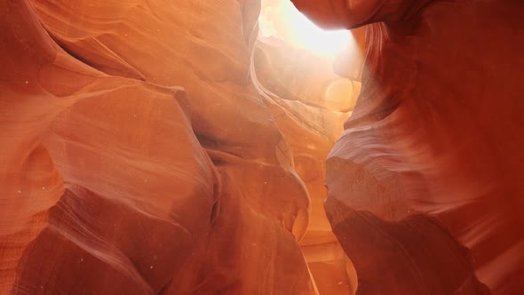 Dust Flies in the Sun in Antelope Canyon, Zoom Out Shot of Red Walls of Antelope Canyon in Arizona alt
