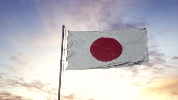 Japan Flag Waving in the Wind Dramatic Sky Background alt
