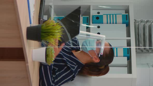 Immobilized Freelancer with Protection Mask Having Videomeeting alt