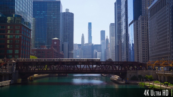 4K Downtown Chicago Skyline with Lift Bridges and Elevated L Train over the River alt