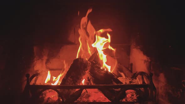 Burning Wood in Fireplace at Home
