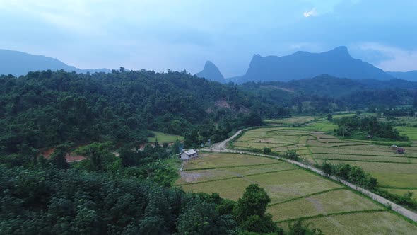 Nature landscape near town of Vang Vieng in Laos seen from the sky alt