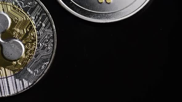 Rotating shot of Bitcoins (digital cryptocurrency) - Ripple alt