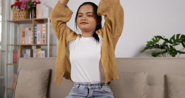 Girl relaxing on couch alt
