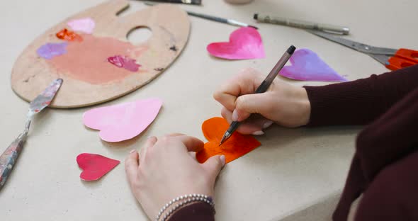 Signing Handmade Cards for Valentine's Day