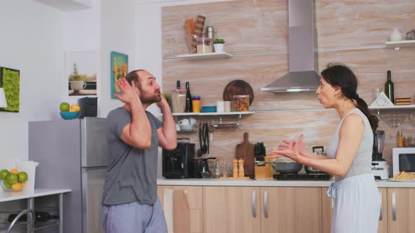 Aggressive Man Threating To Hit Wife alt