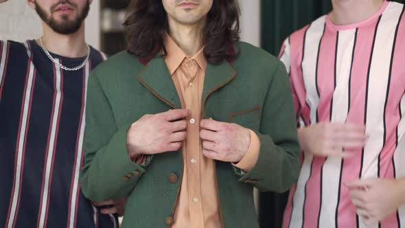 Three Unrecognizable Stylish Confident Retro Men Posing Indoors in 1980s alt