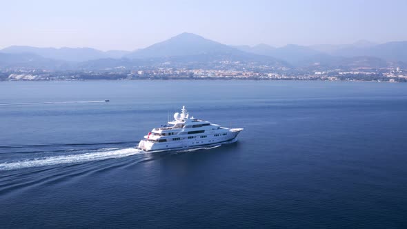 Megayacht cruising on the crowded coast of Andalusia alt