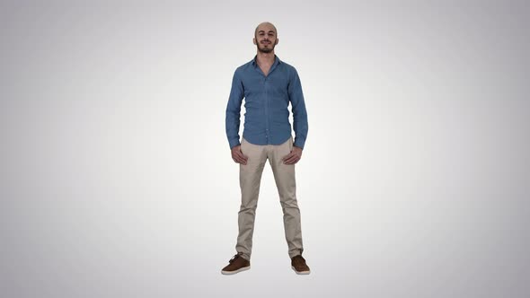 Young Arabic Man Smiling on Gradient Background. alt