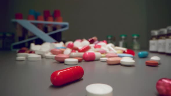 Zoom in Video of Medication Pills and Vials on Table Close Up