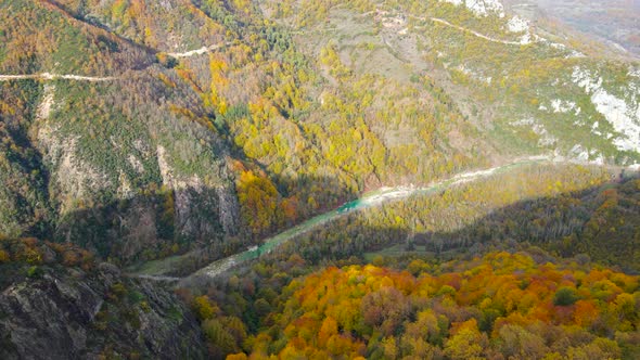 steep green mountains, deep forest and mountain road, beautiful valley and river alt