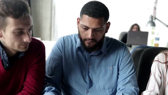 Mix Raced Group of Cheerful Employees Working Together alt