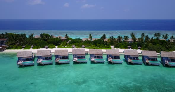 Beautiful overhead abstract view of a summer white paradise sand beach and aqua blue ocean backgroun alt