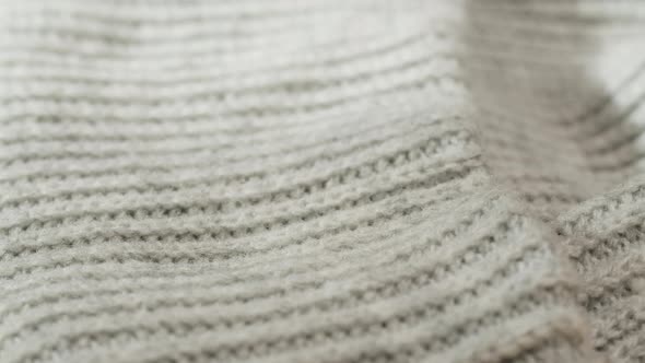 Grey Knitted Cloth Light Gray Woolen Clothes Fabric Closeup Woven Textile Background alt