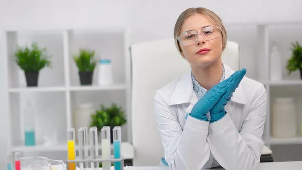 Beautiful Young European Female Doctor Biologist Science in Safety Uniform Posing at White Room alt