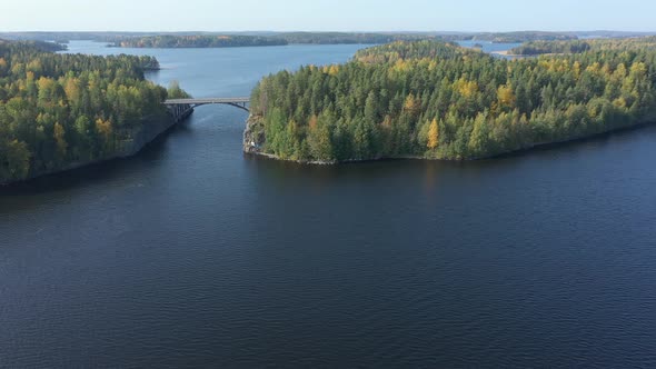 The Island of Trees on the Side of the Bridge in Lake Saimaa in Finland alt