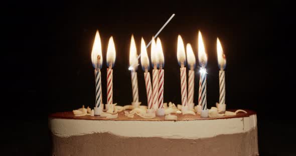 Sparkling Birthday Candles on Cake