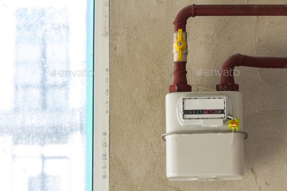 Gas meter in a house under renewal. Indoor gas meter used for measuring natural gas consumption in