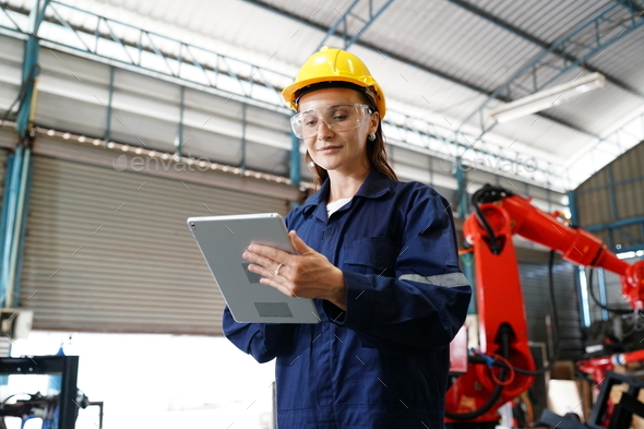 Female engineers working in industry factory. Stock Photo by FoToArtist_1