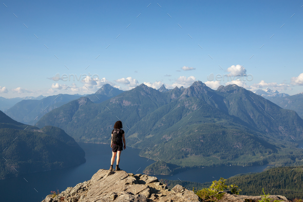 Adventurous Girl Hiking on top of Tin Hat Mountain