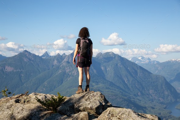 Adventurous Girl Hiking on top of Tin Hat Mountain