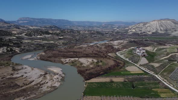 Drone View of Farmland By the River alt