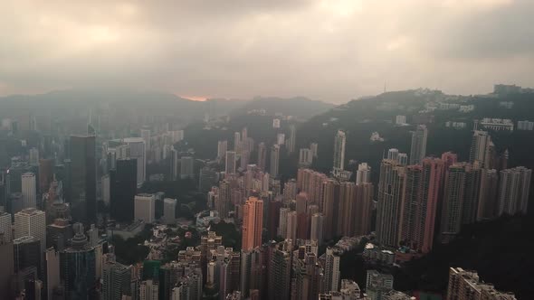 Modern Skyscrapers In Hong Kong City. buildings in Hong Kong city on sunrise. alt