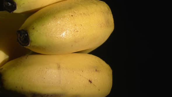 Closeup Shot of Juicy Bananas on a Turntable in Front of the Camera
